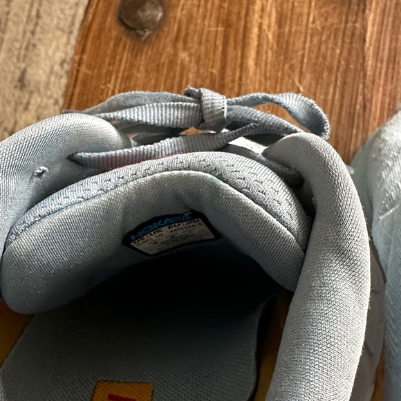 Hoka Pale Blue Running Shoes with Yellow and Red Accents - Picture 15 of 16